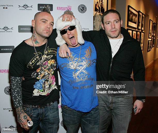 Music artists Shifty Shellshock and Garth McKeown and producer and manager David Weintraub, arrive at the 40x40 photo exhibit by renowned rock...