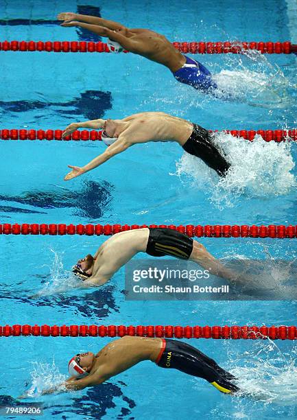 Yu Zhangof China, Helge Meeuw of Germany, Pedro Oliveira of Portugal and Amauri Rodriguez of Mexico at the start of the 100m Backstroke during the...