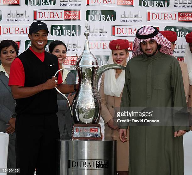 Tiger Woods of the USA is presented with the trophy by Shaikh Ahmed Bin Mohammed Bin Rashid Al Maktoum son of His Highness Shaikh Mohammed Bin Rashid...