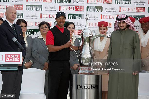 Tiger Woods of the USA is presented with the trophy by Shaikh Ahmed Bin Mohammed Bin Rashid Al Maktoum son of His Highness Shaikh Mohammed Bin Rashid...