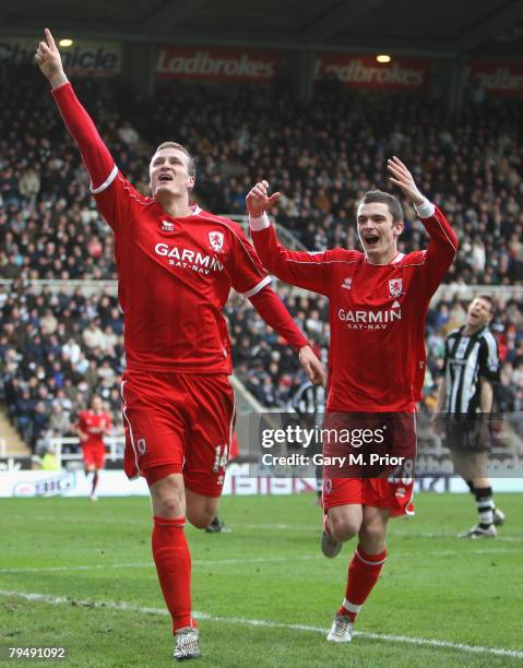 Robert Huth of Middlesbrough celebrates scoring an equalising goal with team mate Adam Johnson during the Barclays Premier League match between...