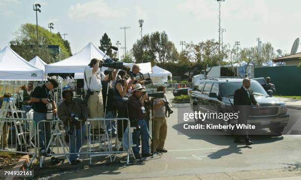 Global media work at pop singer Michael Jackson's child molestation trial as his SUV arrives to pick him up at the Santa Barbara County Court in...