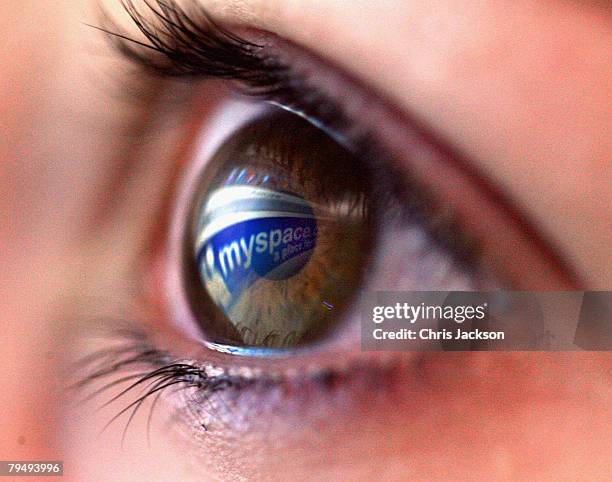 In this photo illustration the myspace logo is reflected in the eye of a girl on February 3, 2008 in London, England. Financial experts continue to...