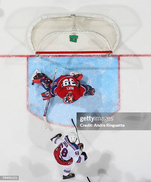 Cristobal Huet of the Montreal Canadiens makes a save on Jaromir Jagr of the New York Rangers at the Bell Centre on February 3, 2008 in Montreal,...