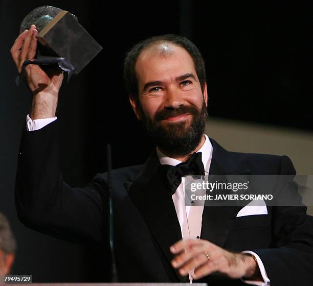 Spanish director Jaime Rosales receives the best picture and director award for 'La Soledad' at the Goya awards ceremony in Madrid on February 3,...