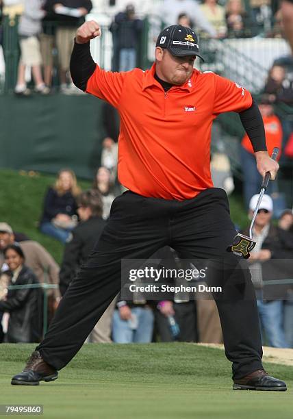 Holmes celebrates as his winning birdie putt drops on the first playoff hole during the final round of the FBR Open on February 3, 2008 at TPC of...