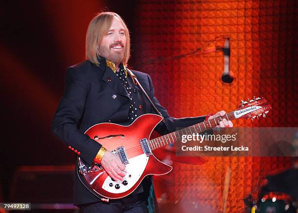 Musician Tom Petty performs at the Bridgestone halftime show during Super Bowl XLII between the New York Giants and the New England Patriots on...