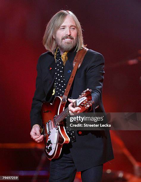 Musician Tom Petty performs at the Bridgestone halftime show during Super Bowl XLII between the New York Giants and the New England Patriots on...