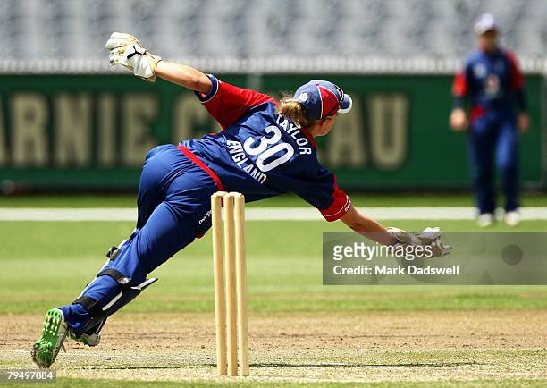 Englands keeper Sarah Taylor takes a diving catch to dismiss Alex Blackwell of the Southern Stars during the Women's One Day International match...