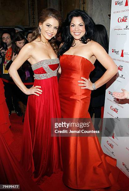 Actress Sara Ramirez and Media Personality Maria Menounos pose for a photo backstage at the Red Dress Fashion Show sponsered by Diet Coke at Bryant...
