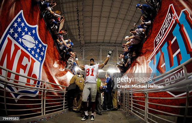 Amani Toomer of the New York Giants walks off the field after defeating the New England Patriots 17-14 in Super Bowl XLII on February 3, 2008 at the...
