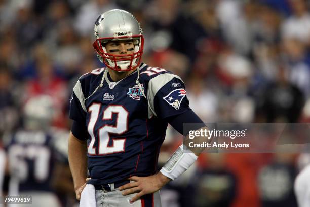 Quarterback Tom Brady of the New England Patriots looks on during Super Bowl XLII against the New York Giants on February 3, 2008 at the University...