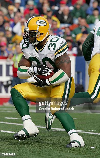 Green Bay Packers running back Ahman Green fights for yards during the game against the Buffalo Bills at Ralph Wilson Stadium in Orchard Park, New...