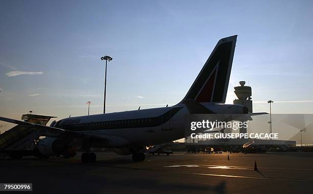 Picture taken on January 1, 2008 in Varese of Alitalia airplane sitting on the tarmac of Malpensa International Airport, north of Milan. Air One is...