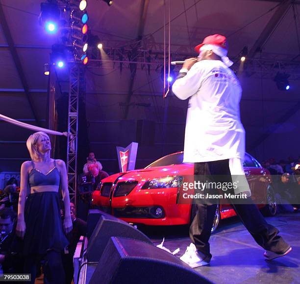 Paris Hilton dances as Rapper 50 Cent performs on the Pontiac Garage Stage at the 944 Magazine/Pontiac party in Scottsdale, Arizona on Friday, Feb....