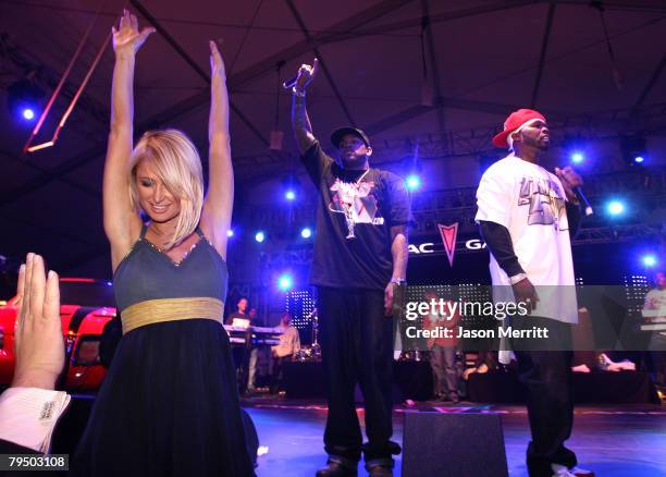 Paris Hilton dances as Rapper 50 Cent performs on the Pontiac Garage Stage at the 944 Magazine/Pontiac party in Scottsdale, Arizona on Friday, Feb....