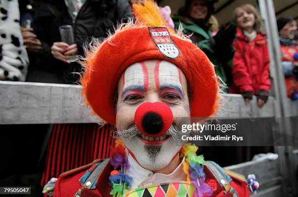 Carnival enthusiast follows the 'Rose Monday' parade February 4, 2008 in Cologne, Germany. Hundreds of thousands people flood the streets of Cologne...