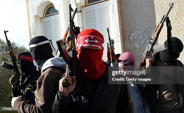 Palestinian militants of Abu Ali Mustafa Brigades a group linked to the Popular Front for the Liberation of Palestine arrive for a press confrence on...