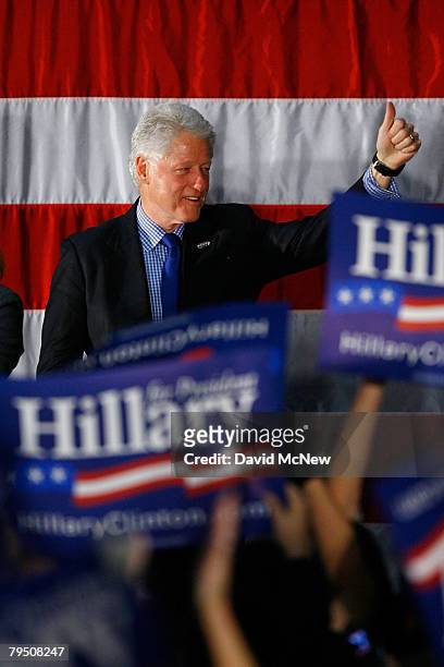 Former U.S. President Bill Clinton campaigns for his wife and Democratic presidential hopeful U.S. Sen. Hillary Clinton during a campaign rally for...