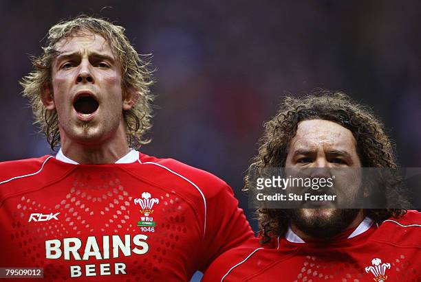 Alun Wyn Jones and Adam Jones of Wales sing the national anthem prior to kickoff during the RBS Six Nations Championship match between England and...