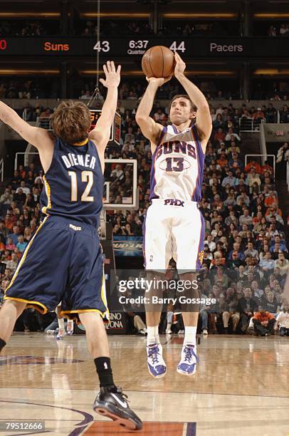 Steve Nash of the Phoenix Suns shoots over Travis Diener of the Indiana Pacers during the game at U.S. Airways Center on January 9, 2008 in Phoenix,...