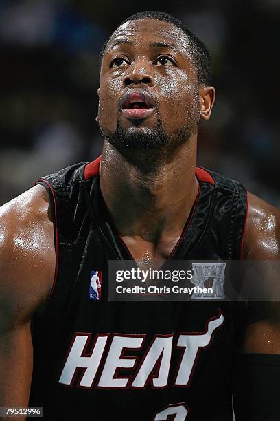 Dwyane Wade of the Miami Heat shoots a free throw during the game against the New Orleans Hornets on January 11, 2008 at the New Orleans Arena in New...