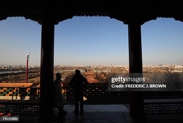 By Charles Whelan People take in the view of central Beijing from the top of Coal Hill, or Jingshan Park, looking northward along the former imperial...