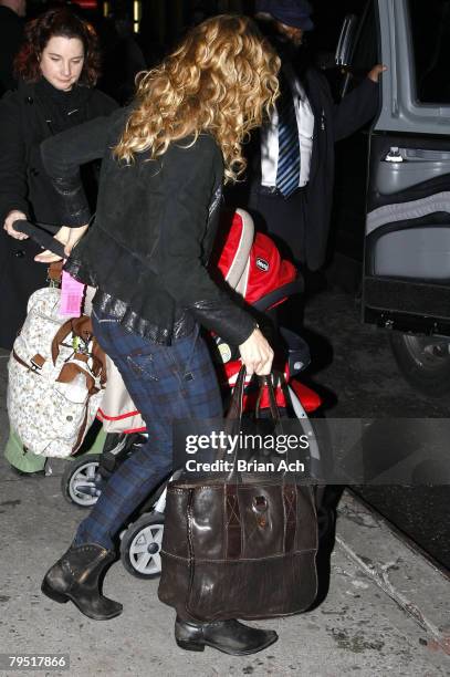 Singer Sheryl Crow with her child Wyatt Steven as she visits "Late Show with David Letterman" on February 4 at the Ed Sullivan Theatre in New York...