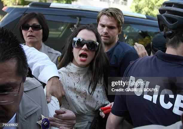 Picture taken January 14, 2008 shows US pop star Britney Spears arriving at the Los Angeles County Superior courthouse for a hearing regarding...