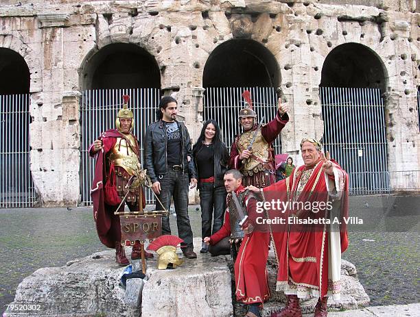 Omar Bin Laden, the 26-years-old son of al Qaeda leader Osama Bin Laden, and his wife Jane Felix-Browne pose in front of the Colosseum with men...