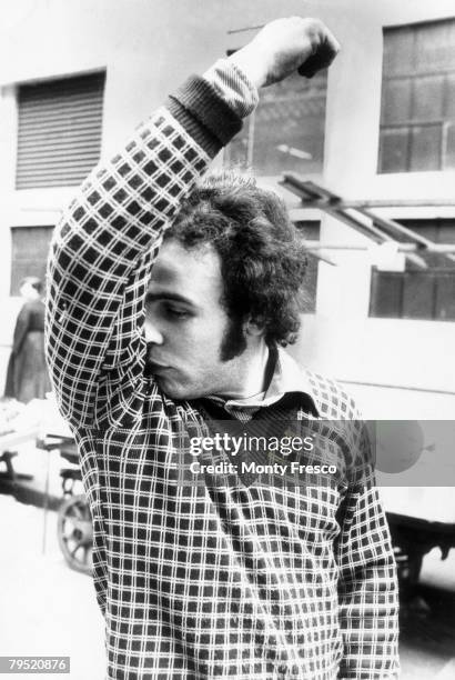 Henry John Burns sniffs his armpit, March 1976. Burns was quoted in the Evening Standard newspaper as saying 'You've got to sniff your own armpits,...