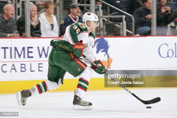 Pierre-Marc Bouchard of the Minnesota Wild skates with the puck against the Columbus Blue Jackets on February 2, 2008 at Nationwide Arena in...