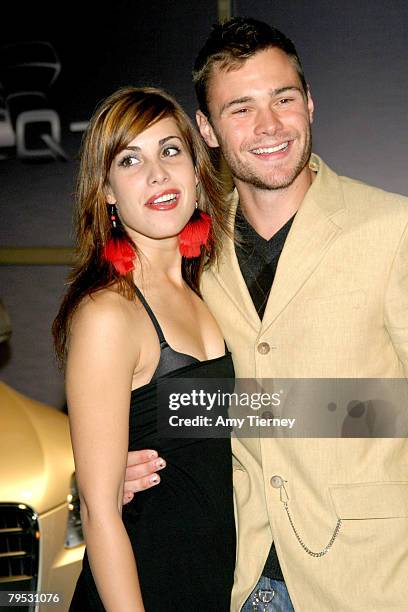 Carly Pope and Patrick Flueger