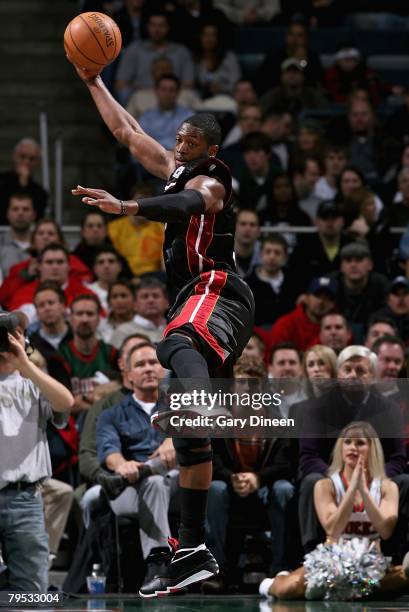 Dwyane Wade of the Miami Heat rebounds against the Milwaukee Bucks during the game on January 9, 2008 at the Bradley Center in Milwaukee, Wisconsin....