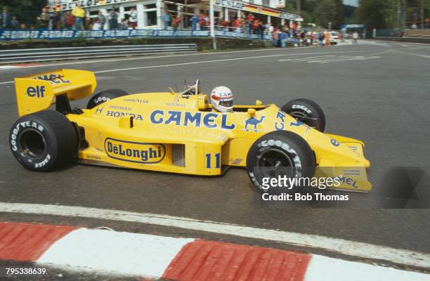 Japanese racing driver Satoru Nakajima drives the Camel Team Lotus Honda Lotus 99T Honda RA166E 1.5 V6t to finish in 5th place in the 1987 Belgian...