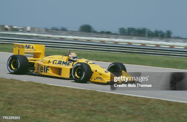 Brazilian racing driver Nelson Piquet drives the Camel Team Lotus Honda Lotus 100T Honda V6t to finish in 3rd place in the 1988 Brazilian Grand Prix...