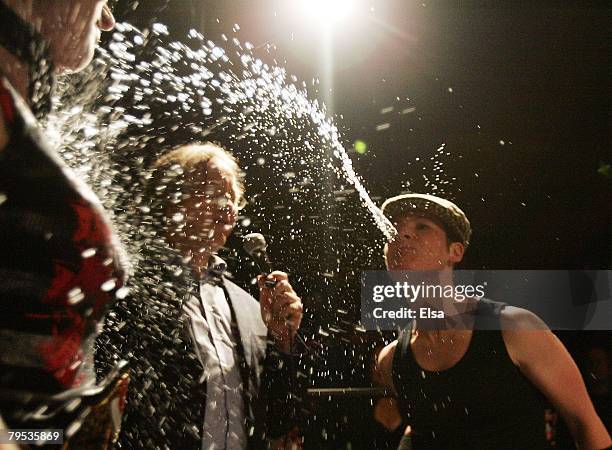 Boozy Suzy spits her drink at Champain during a fight preview meeting in front of the fans at the Petit Campus on May 5,1007 in Montreal, Quebec....