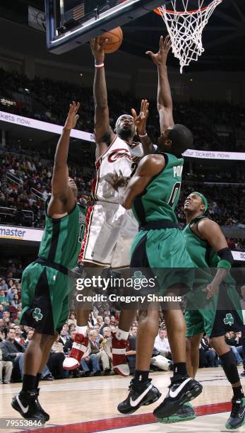 LeBron James of the Cleveland Cavaliers gets to the basket between Glen Davis, Leon Powe and Paul Pierce of the Boston Celtics on February 5, 2008 at...