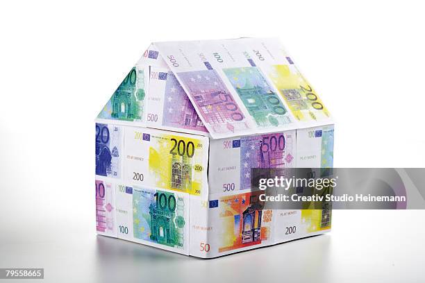 single house of euro notes - valuta stock pictures, royalty-free photos & images