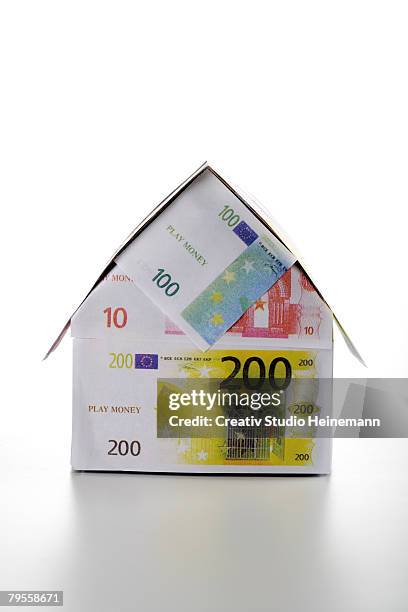 single house of euro notes - valuta stock pictures, royalty-free photos & images