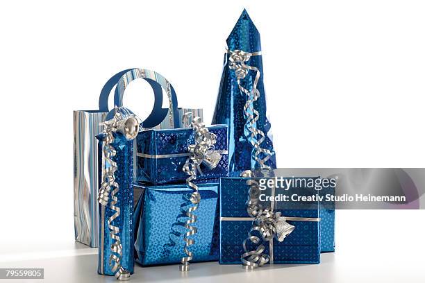 christmas parcels - blue purse stock pictures, royalty-free photos & images
