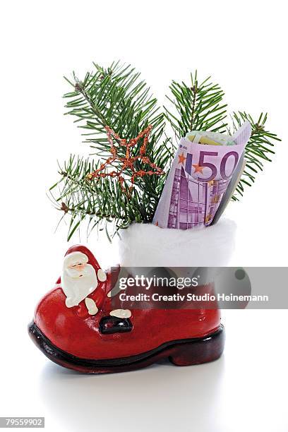 santa boot with money - nikolausstiefel stock-fotos und bilder