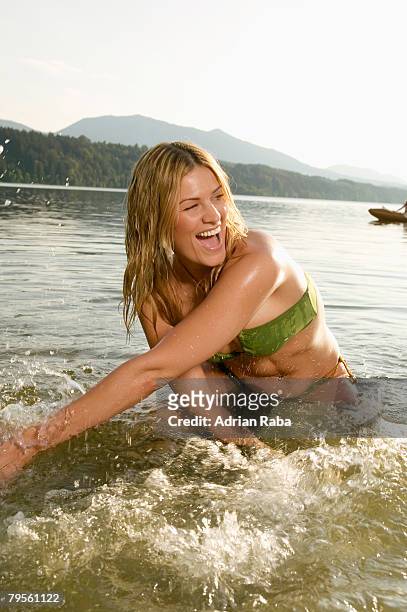 woman bathing in lake - pleading bildbanksfoton och bilder