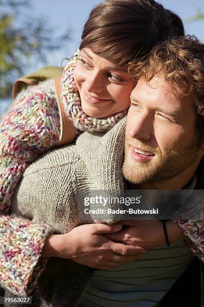 young couple, woman embracing man - bearded blonde man stock-fotos und bilder