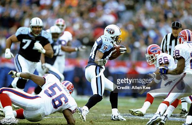 Tennessee Titans wide receiver Kevin Dyson catches a short pass during the AFC Wildcard Playoff, a 22-16 victory over the Buffalo Bills on January 8...