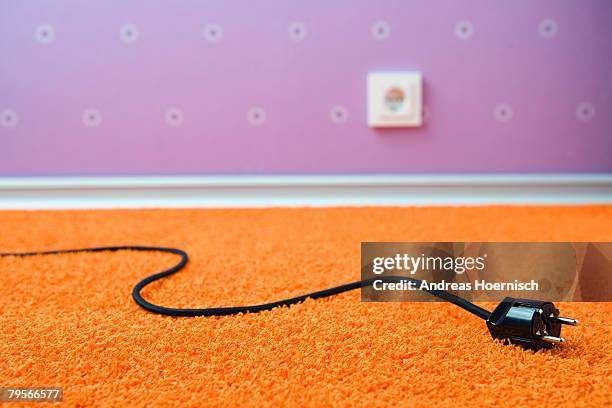 pulled plug on rug - elkontakt bildbanksfoton och bilder