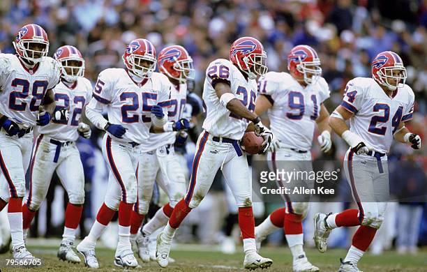Members of the Buffalo Bills celebrate what appeared to be the game-winning field goal with 16 seconds left in the game during the AFC Wildcard...