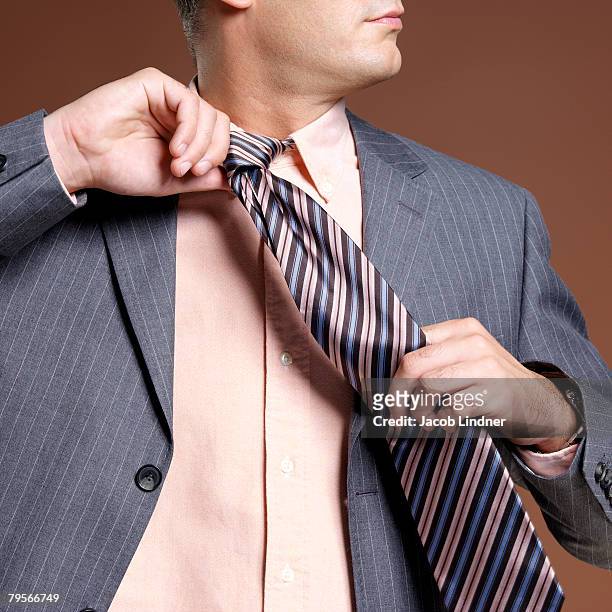 businessman wearing suit and tie, close-up - open collar stock pictures, royalty-free photos & images