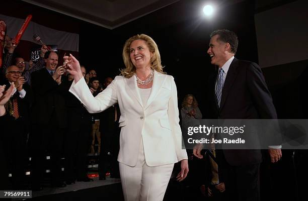 Republican presidential candidate and former Massachusetts governor Mitt Romney and his wife Ann Romney walk on stage as they are introduced during...