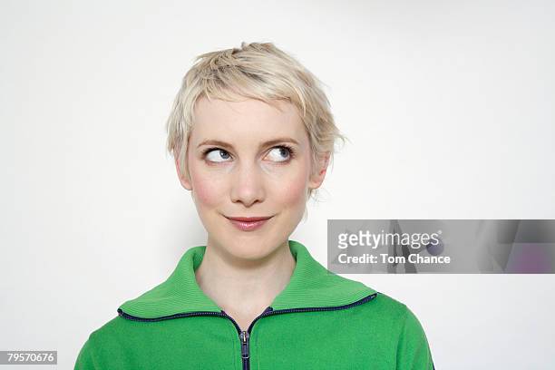 portrait of a blonde woman - looking up stock pictures, royalty-free photos & images